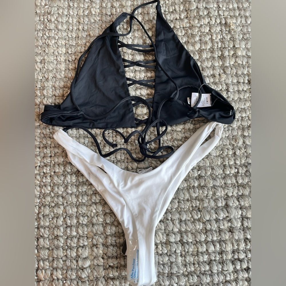 Buy 2 get 1 free Nwt Dippin’ Daisy’s high neck lace up white thong bikini